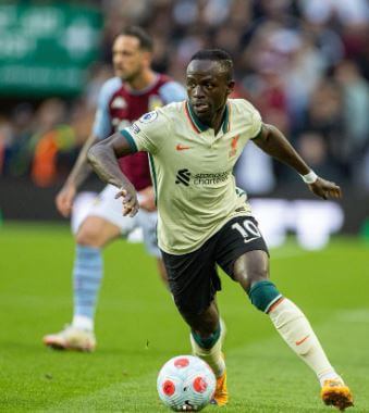 Melissa Reddy boyfriend Sadio Mane in the field.